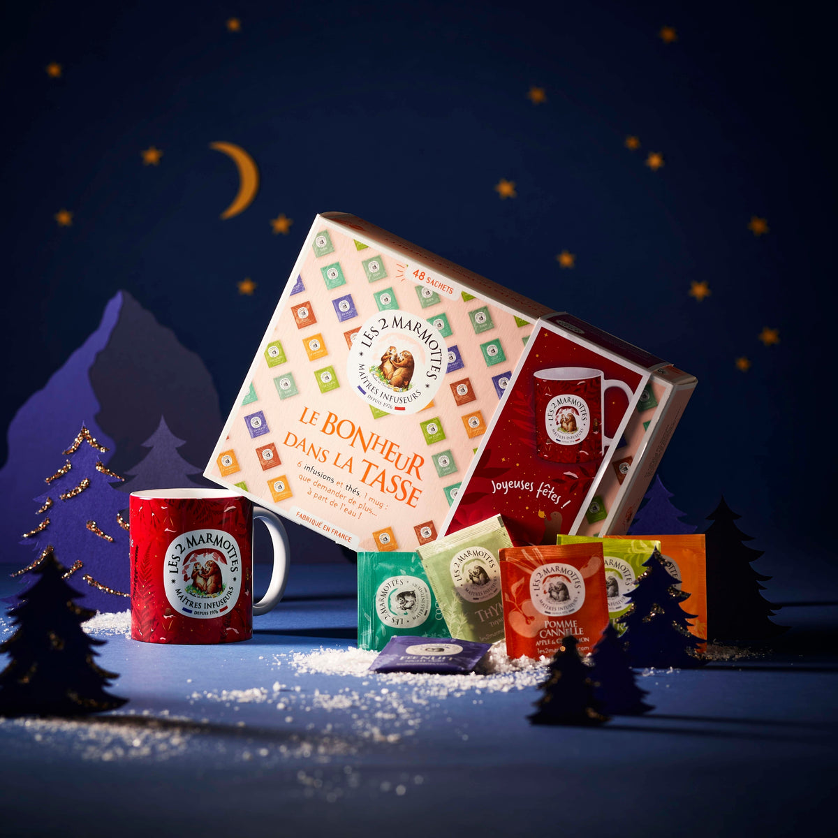 Coffret cadeau noel 1 Mug de Noël + 6 parfums différents de tisanes et thés. Coffret 48 sachets Le Bonheur dans la Tasse