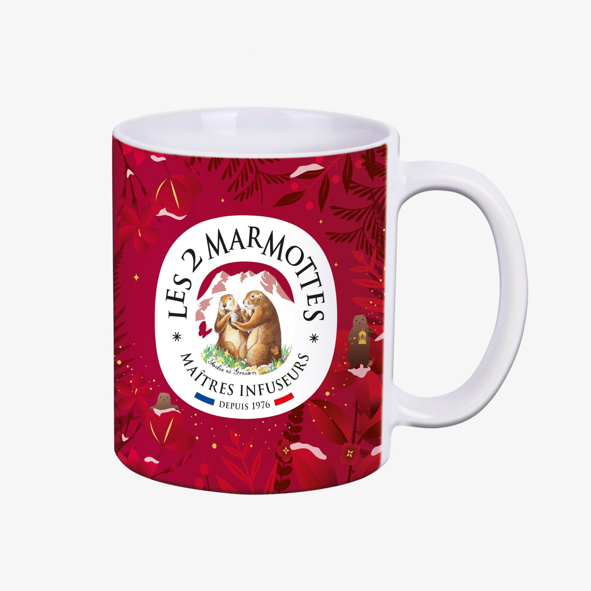 Mug de Noël rouge Les 2 Marmottes à citation Vive le Vent, décor rouge blanc et or, orné au verso du logo les 2 marmottes
